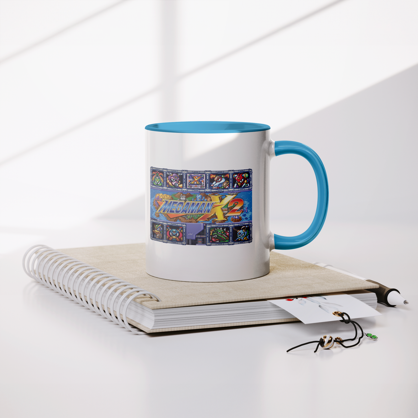 Mega_Man_X2_-_11oz_Mug_Lifestyle_Notebook_Mockup.png