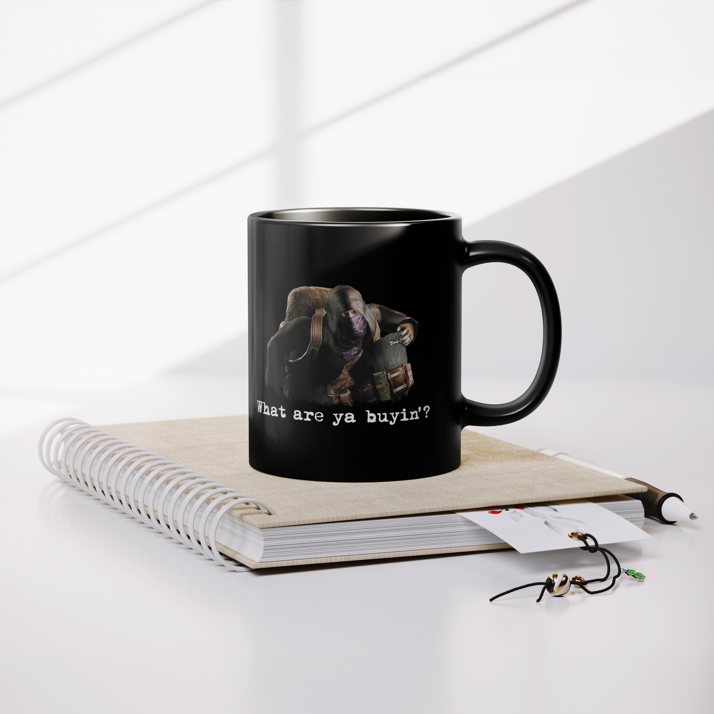 Resident_Evil_4_Merchant_-_Mug_Lifestyle_Notebook_Mockup.png_15427708