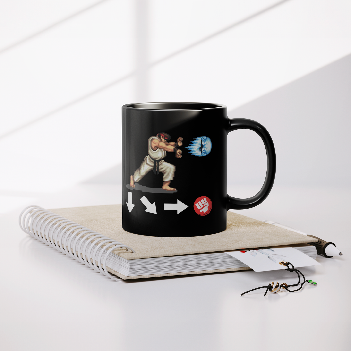 Ryu_Hadouken_-_11oz_Mug_Lifestyle_Notebook_Mockup.png