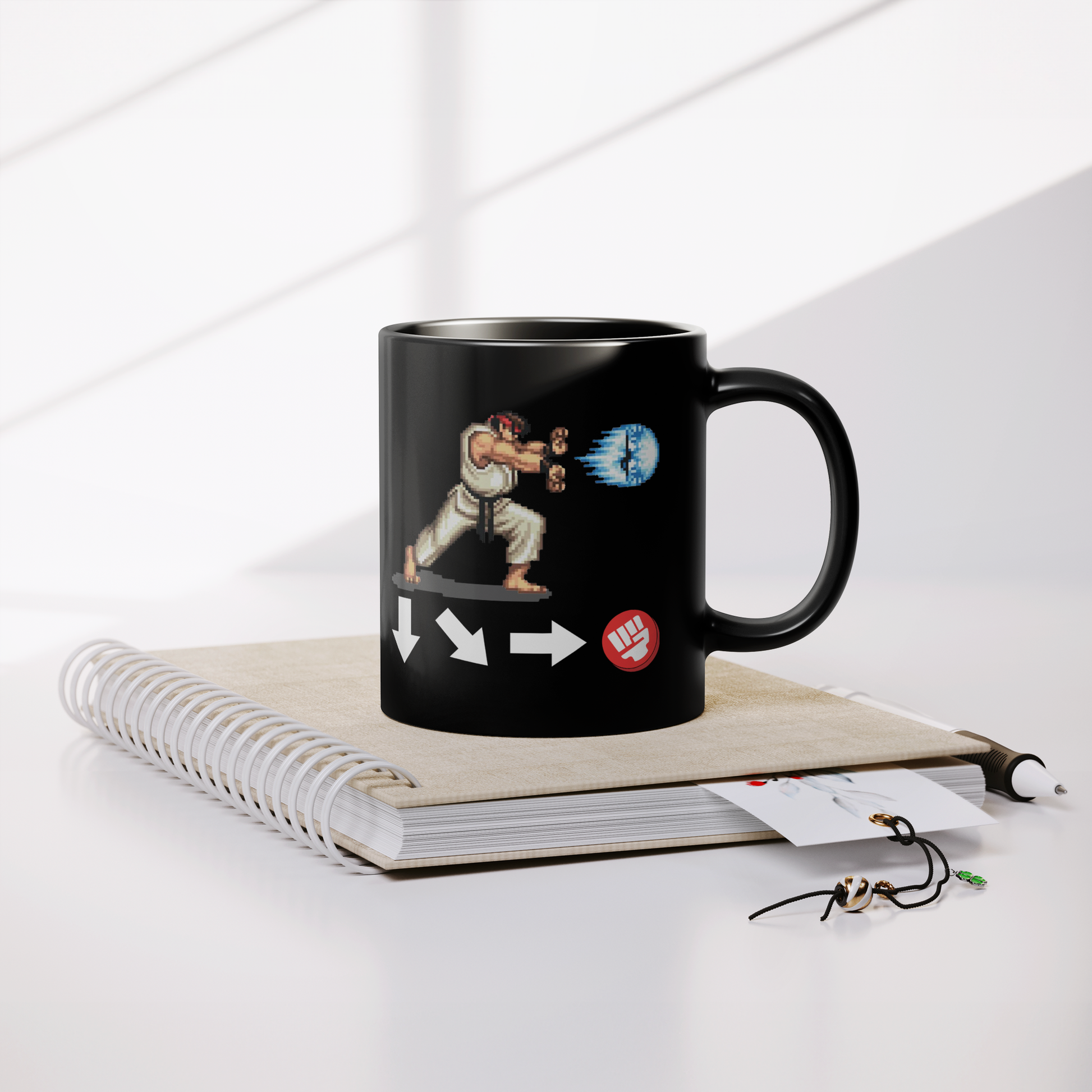 Ryu_Hadouken_-_11oz_Mug_Lifestyle_Notebook_Mockup.png
