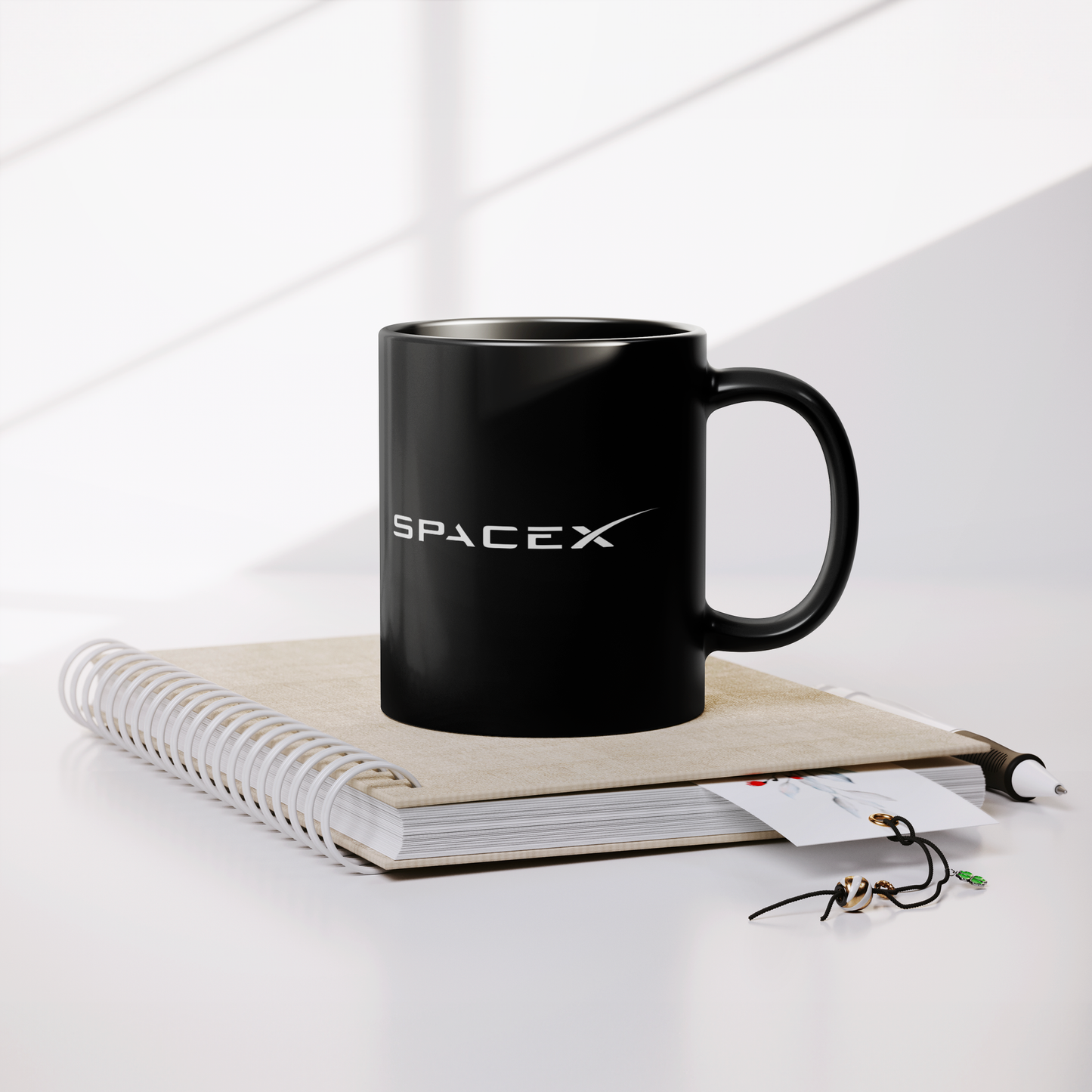 SpaceX_11oz_Mug_Lifestyle_Notebook_Mockup.png_15439785