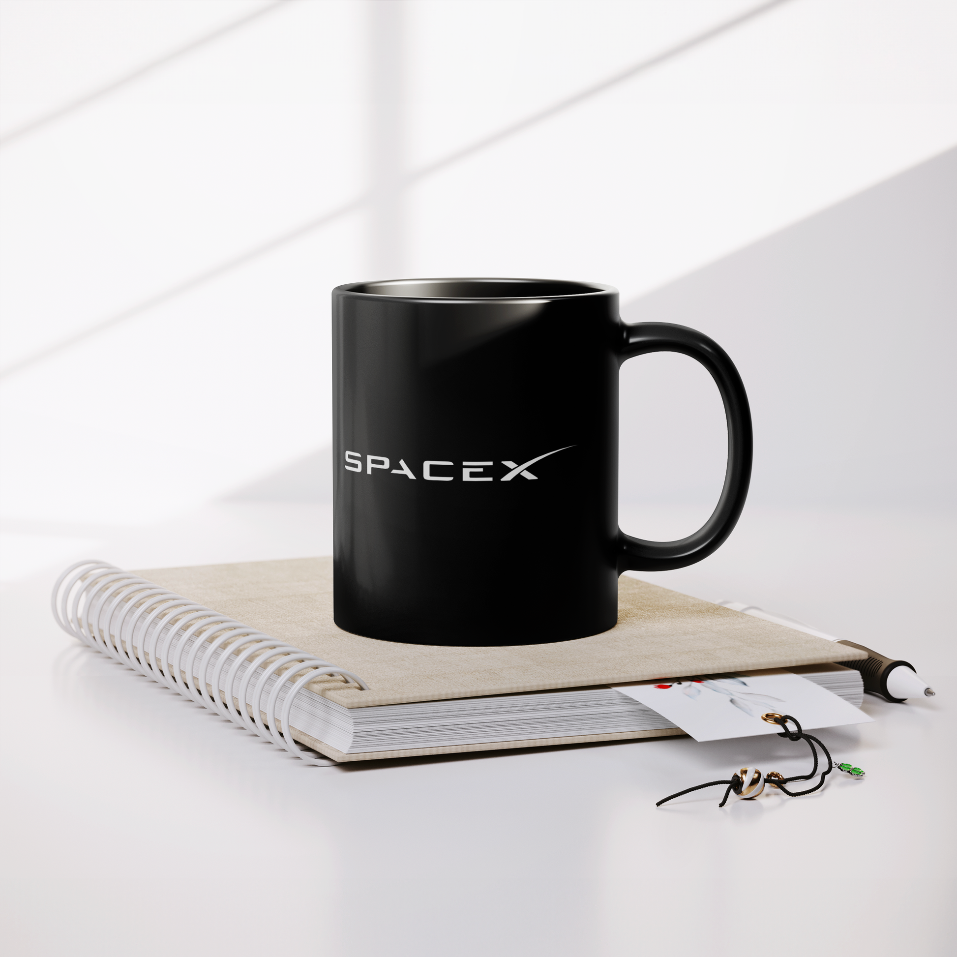 SpaceX_11oz_Mug_Lifestyle_Notebook_Mockup.png_15439785
