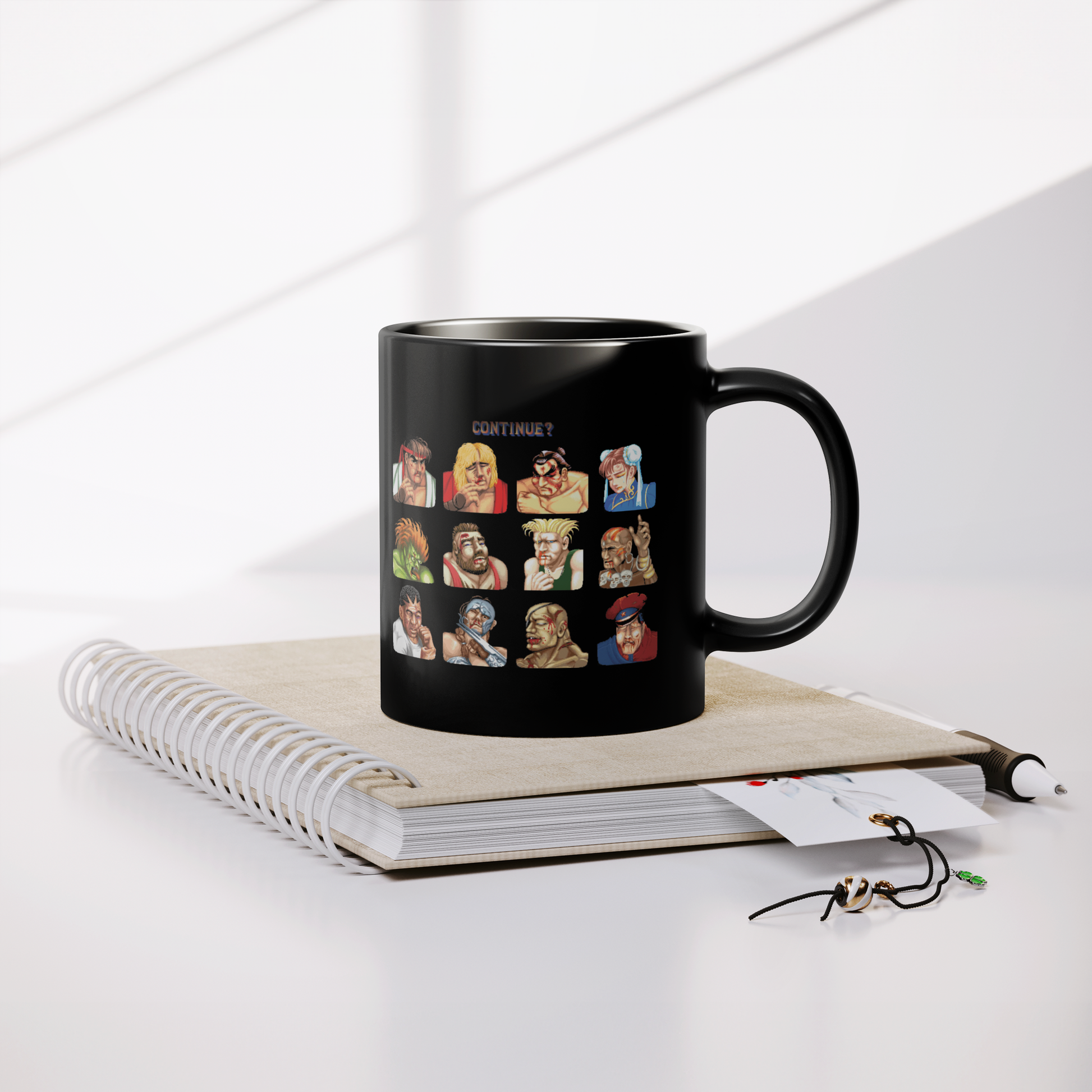 Street_Fighter_2_-_11oz_Mug_Lifestyle_Notebook_Mockup.png