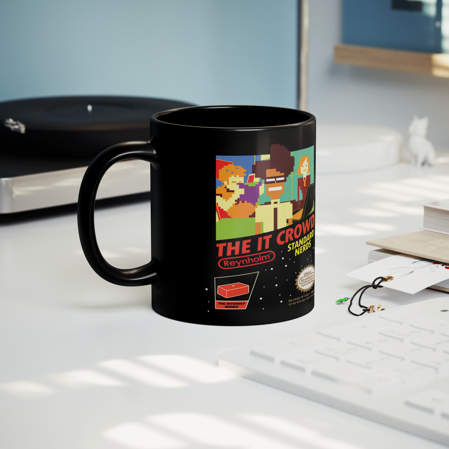 The_IT_Crowd_NES_-_11oz_Mug_Lifestyle_Record_Player_Mockup.png
